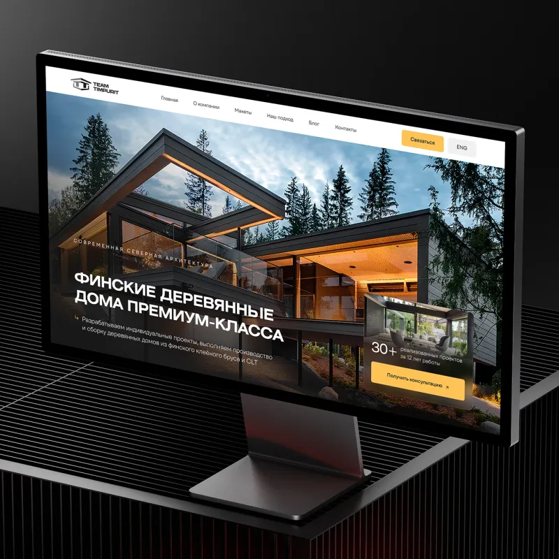 Team Timpurit website on a monitor: “Premium Finnish wooden houses”