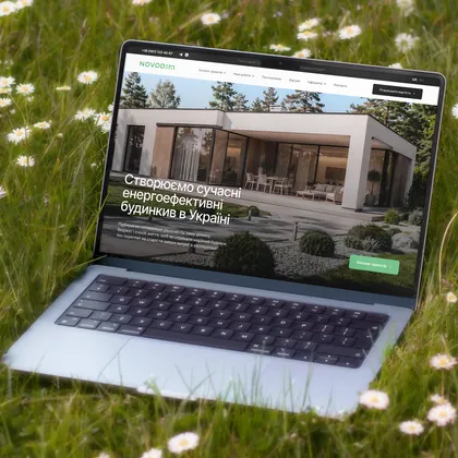NOVODIM multi-page website for energy-efficient house construction on a laptop