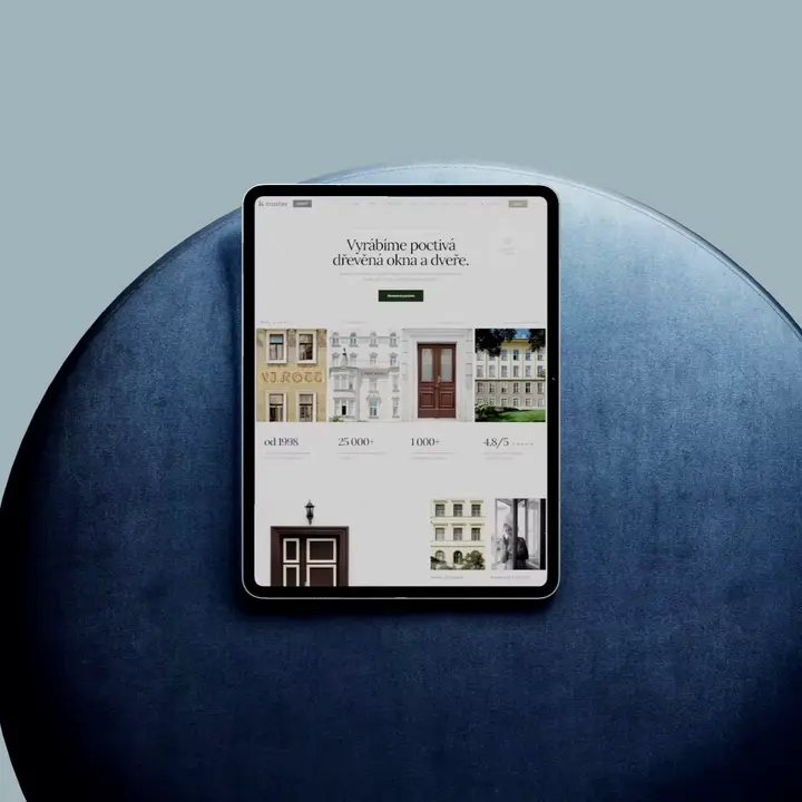 Redesigned website of a wooden window and door manufacturer on a tablet screen